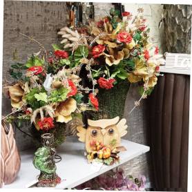 Composizioni floreali stile rustico con fiori artificiali in vasi decorativi