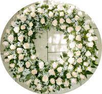 Corona funebre di rose rotonda